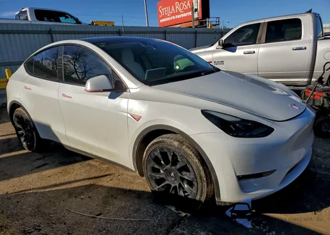 2022 Tesla Model Y from USA, damaged, VIN 7SAYGAEE8NF520225